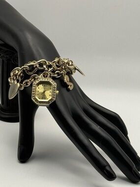 Bongo Women's Gold Tone Charm Bracelet Watch Crystal Accents Quartz New Battery